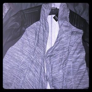 Torrid jacket with faux leather sleeves